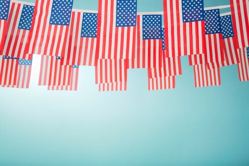 Rows of small American flags strung up for a hometown celebration