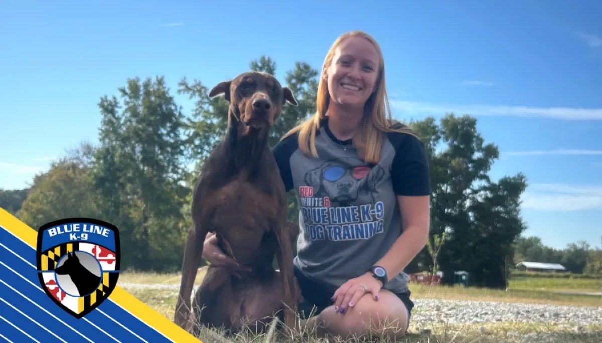 Owner learning to train her dog side by side in a JoCo Gold lesson